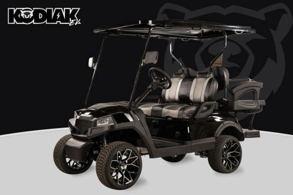 Black two-passenger Kodiak APEX golf cart