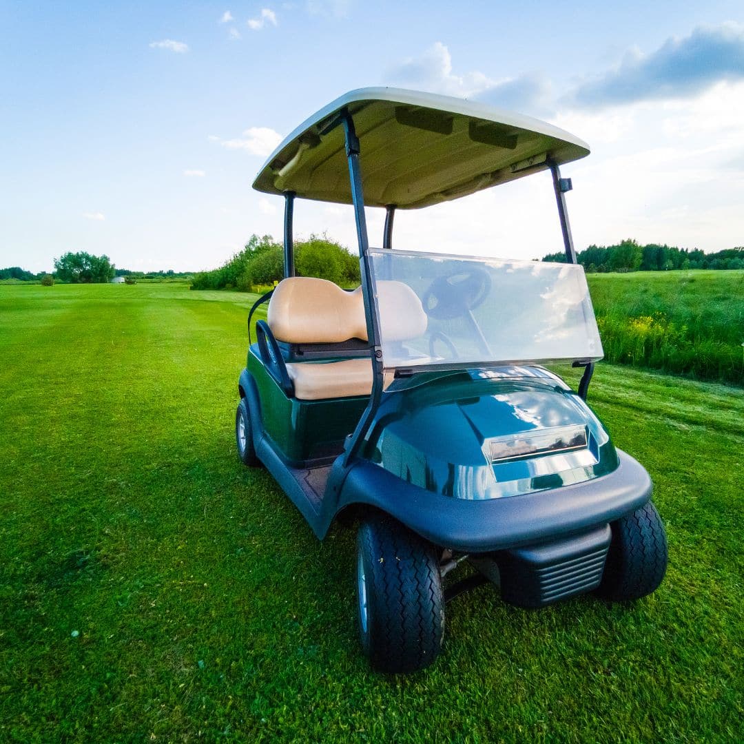 golf cart on a green field